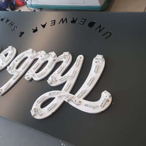 External wall-mounted signs